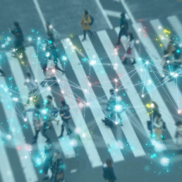 Smart city-blurry background of people crossing street